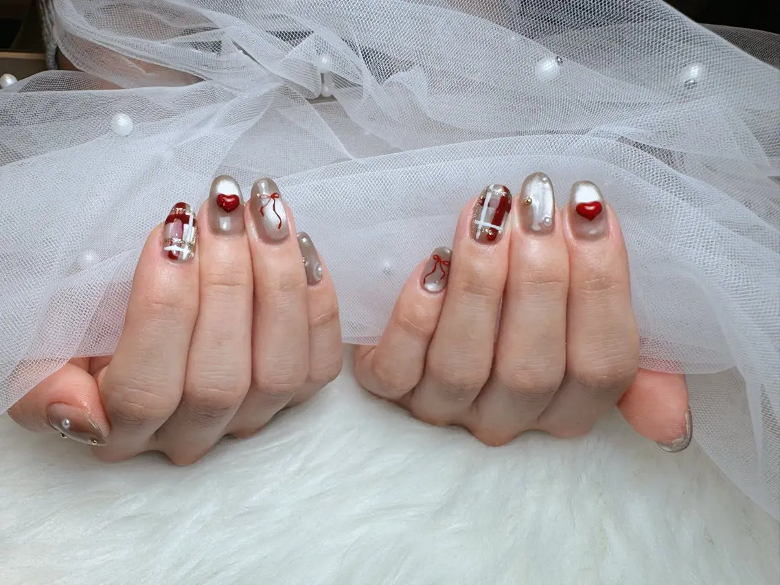 ネイル ブルー ハート マグネットネイル リボン 冬ネイル ハンドネイル Nail Salon K&Rのネイルデザイン