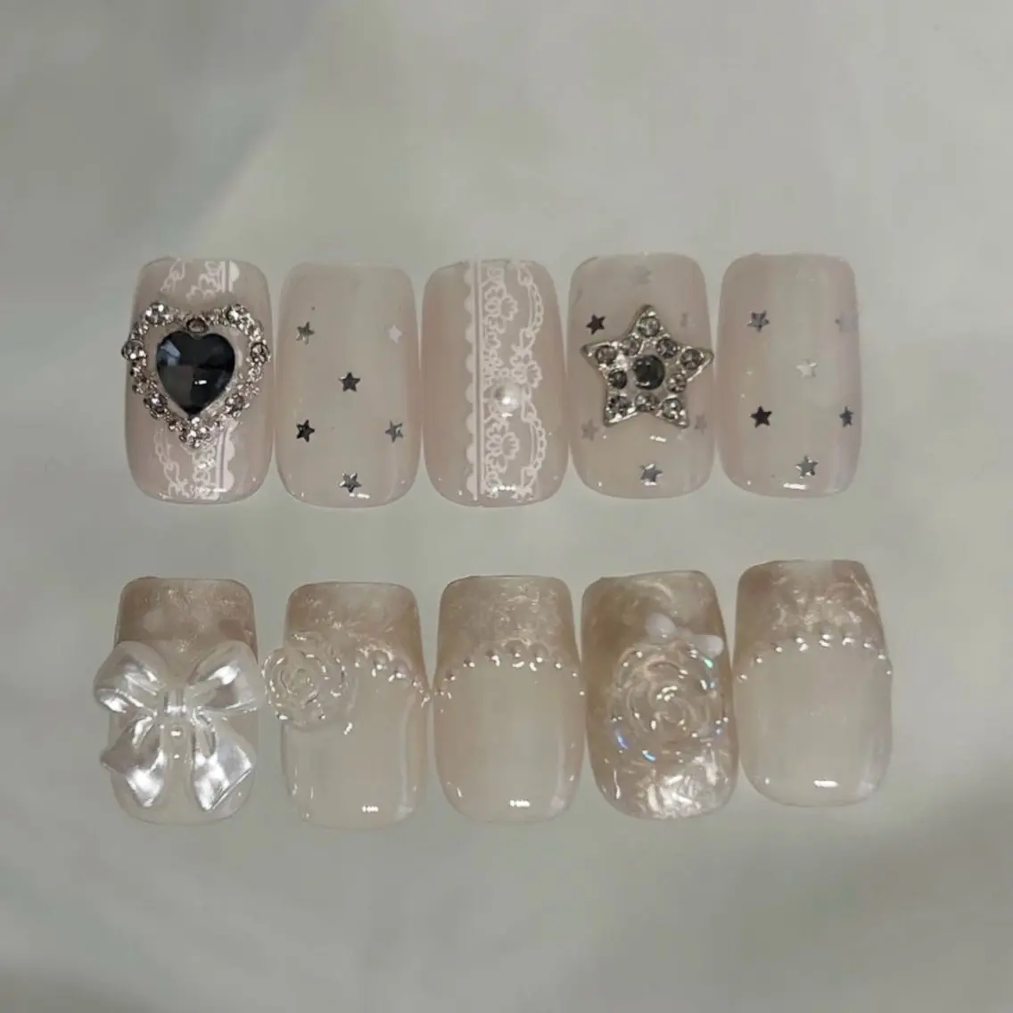 ネイル ブラウン フレンチネイル ガーリー ハート キラキラネイル ハンドネイル ハンドケア lylynail YUUKAのネイルデザイン