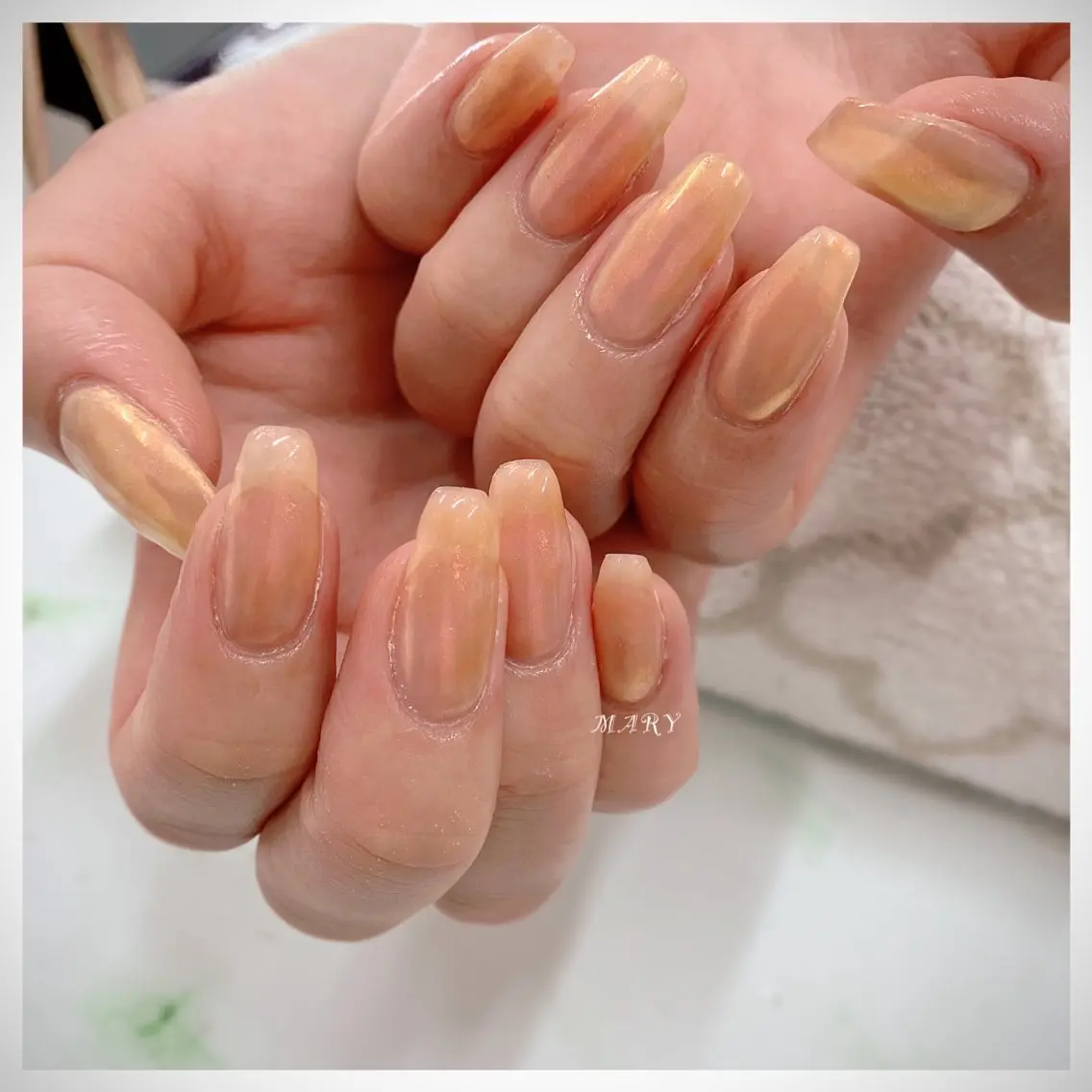 ネイル オーロラネイル ミラーネイル ニュアンスネイル ワンカラーネイル オレンジ ハンドネイル Mary nail .narumiのネイルデザイン