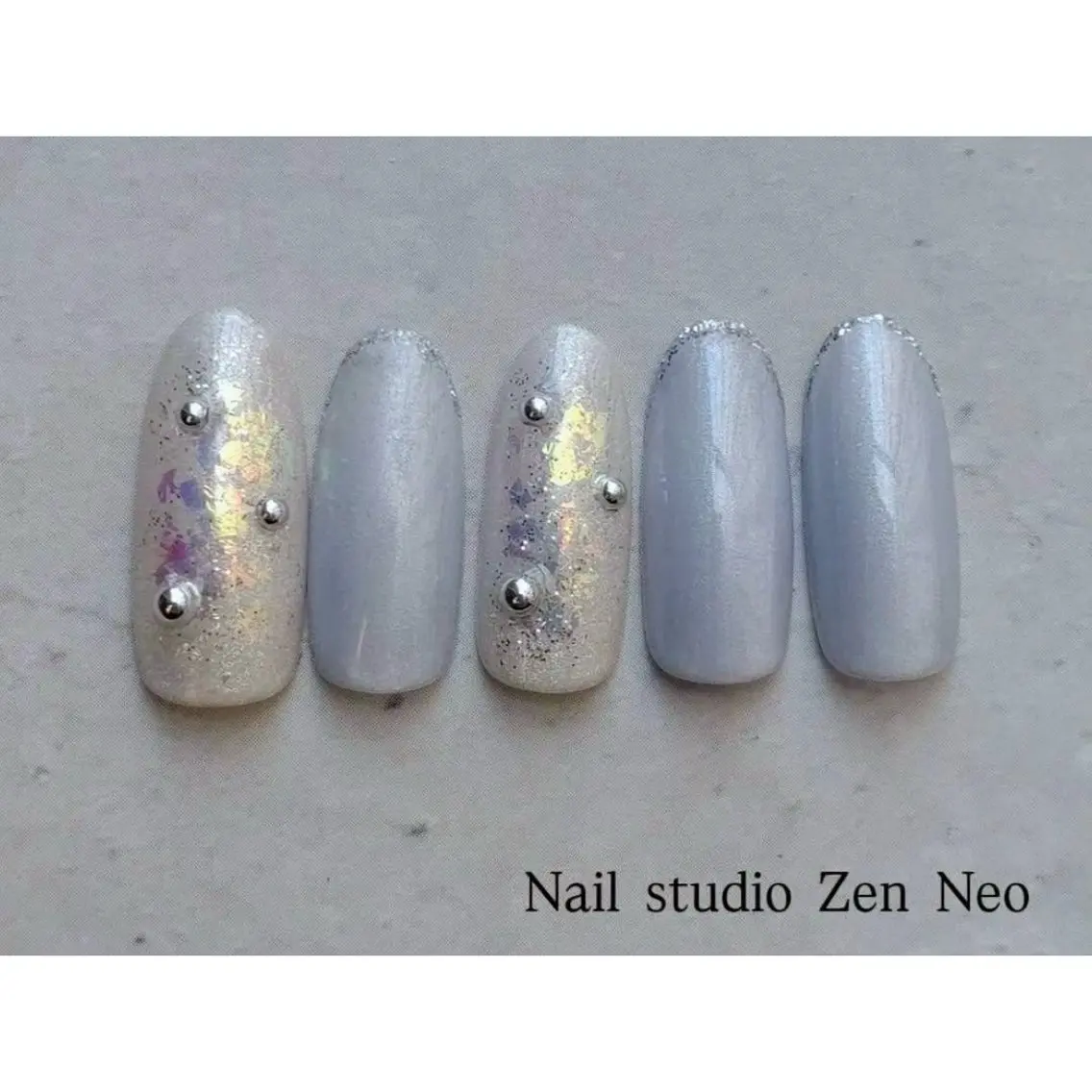 ネイル オーロラネイル ブルー ニュアンスネイル ハンドネイル Zen Neo / SEINA🎀のネイルデザイン