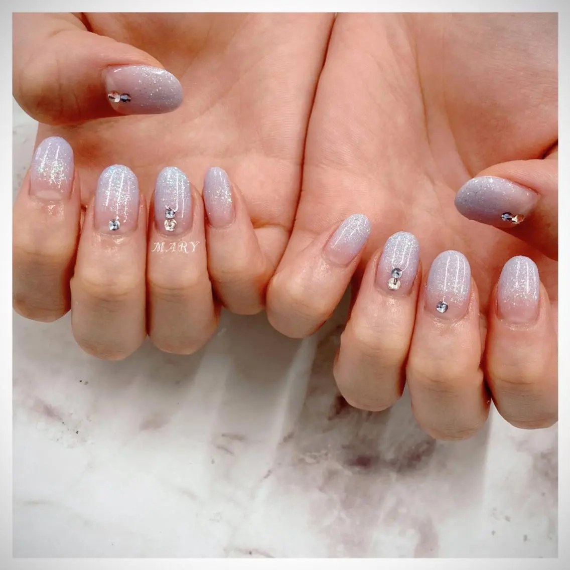 ネイル グラデーション キラキラネイル ラメ(グリッター) 水色 ニュアンスネイル ハンドネイル Mary nail .narumiのネイルデザイン
