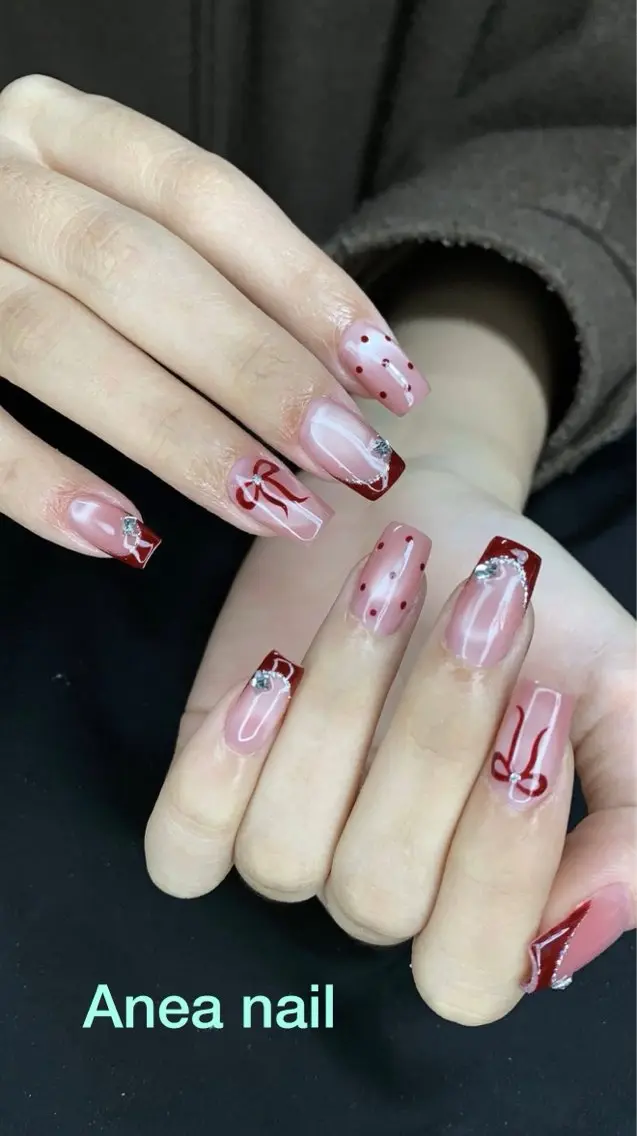 ネイル マグネットネイル 赤色 リボン Anea Nailのネイルデザイン
