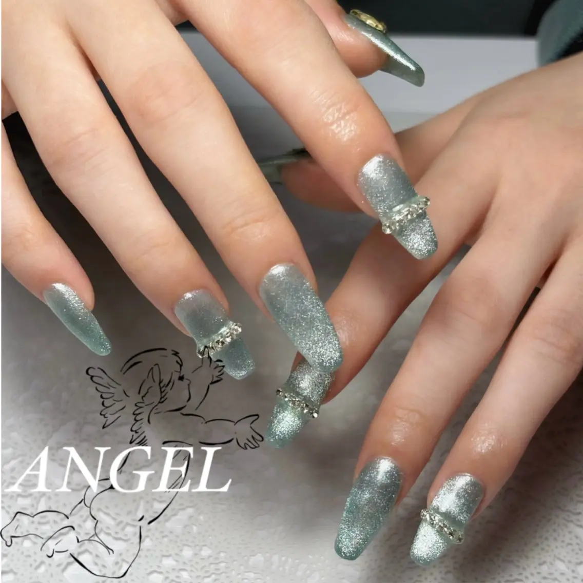 セミロング ハンドネイル angel nailのエステ・リラクイメージ