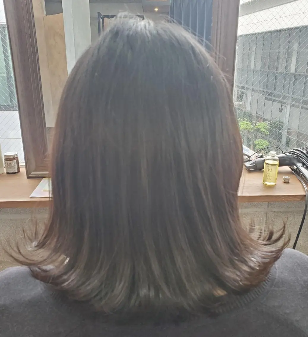 ミディアム ボブ 外ハネヘア カット パーマ トリートメント S. ERIのヘアスタイル