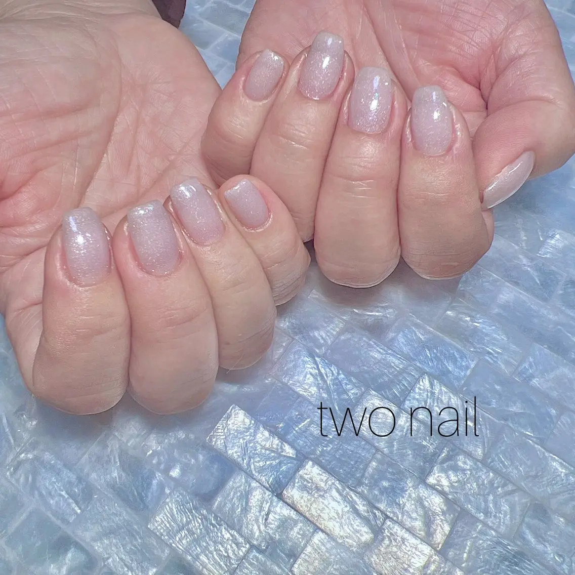 ネイル キラキラネイル ネイルチップ ホワイト ハンドネイル two nailのネイルデザイン