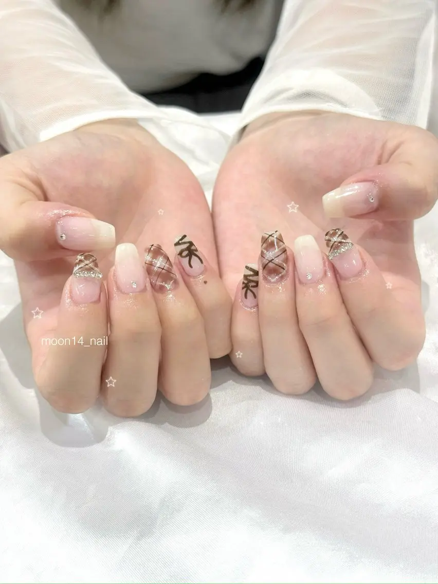 ネイル ブラウン ジェルネイル パラジェル リボン 冬ネイル ハンドネイル natsuki 💫のネイルデザイン