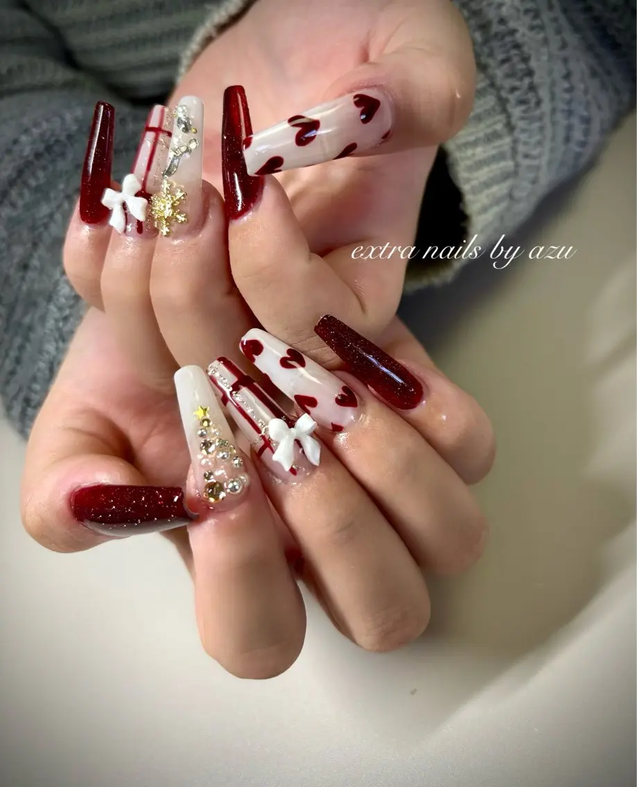 ネイル ハート ロングネイル ネイルチップ 冬ネイル クリスマス ハンドネイル extranails ／lemellaのネイルデザイン