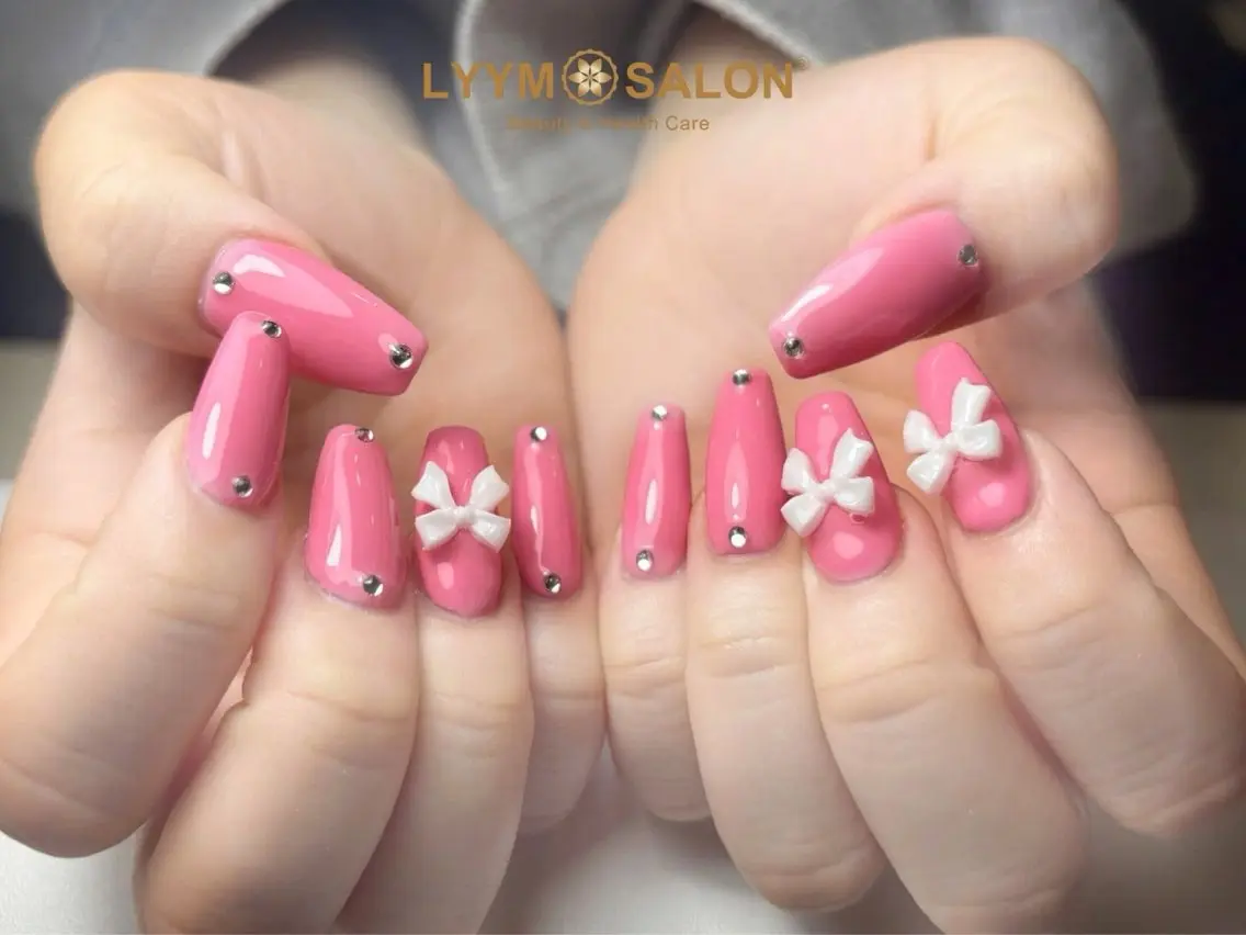 ネイル ガーリー 韓国ネイル ピンク リボン シンプルネイル LYYM Salonのネイルデザイン