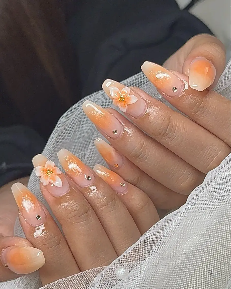 ネイル チークネイル オレンジ ハンドネイル touma Rinaのネイルデザイン