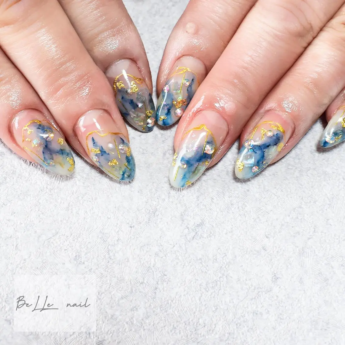 ネイル ブルー キラキラネイル ストーンネイル BeLLe nailのネイルデザイン