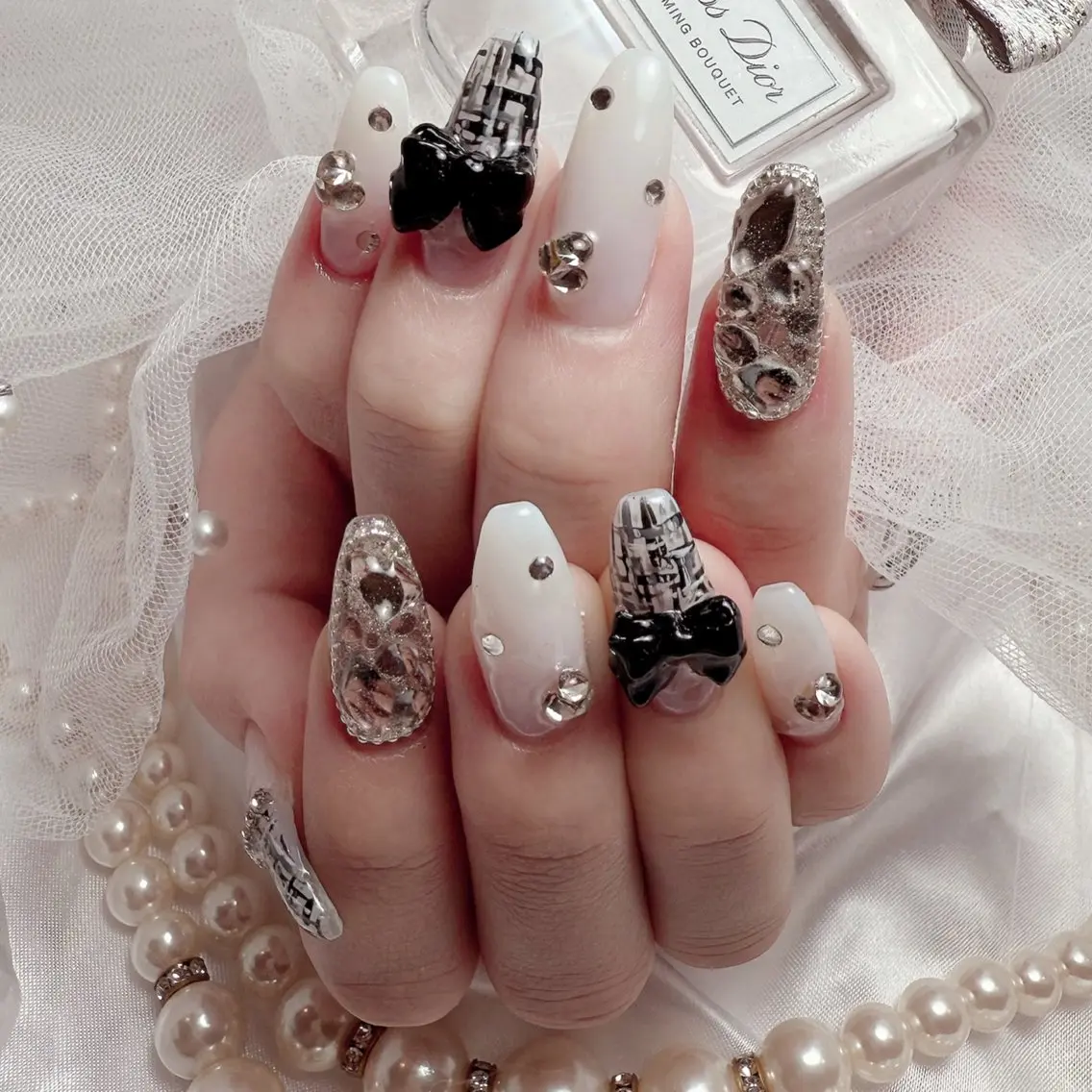セミロング ハンドネイル Conjunim MAMI🎀✨のネイルデザイン
