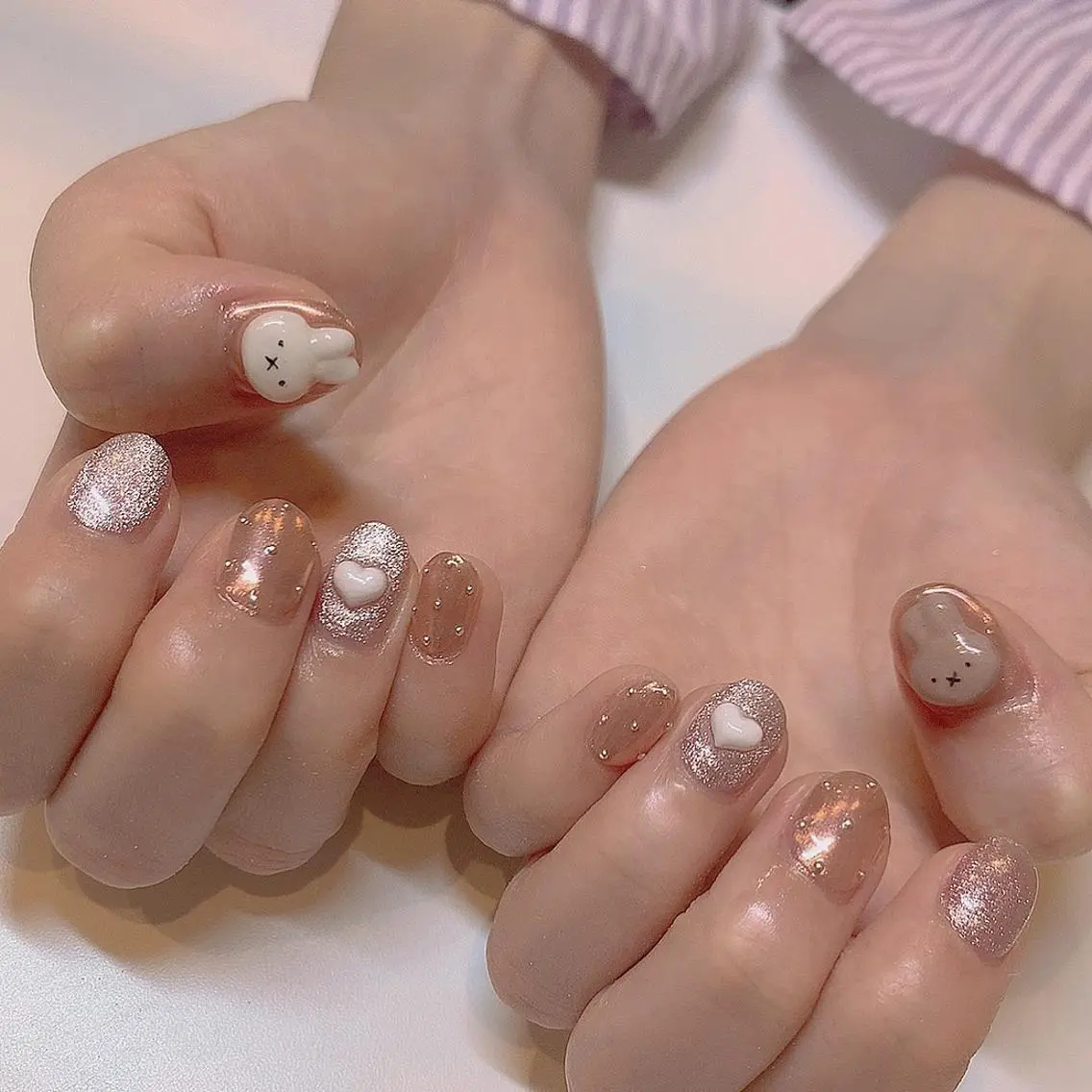 ネイル ヤマダ サクラのヘアスタイル