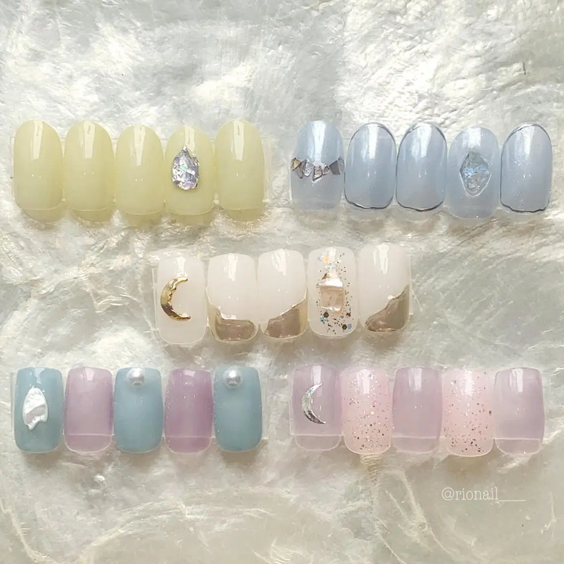 ネイル ハンドネイル 𝘙𝘪𝘰𝘯𝘢 ...🕯🤍のネイルデザイン