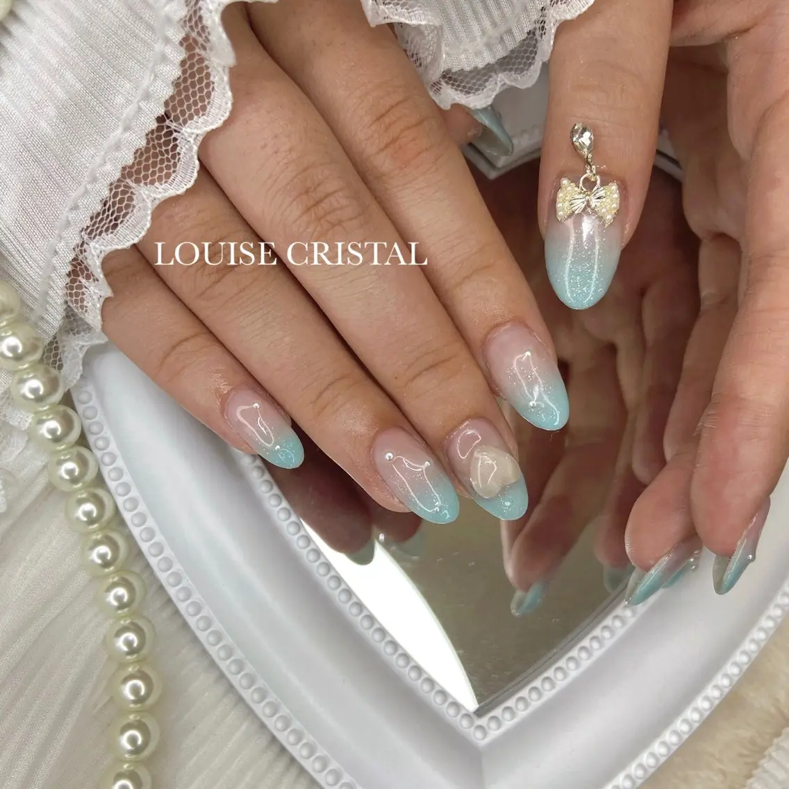 ネイル ハンドネイル LOUISE CRYSTALのネイルデザイン