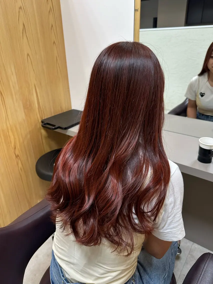 ロング カラー ヘアアレンジ ブリーチ ブリーチなしカラー オレンジ レッドカラー カット ヘアカラー トリートメント sena/博多/ コテ巻き風パーマのヘアスタイル