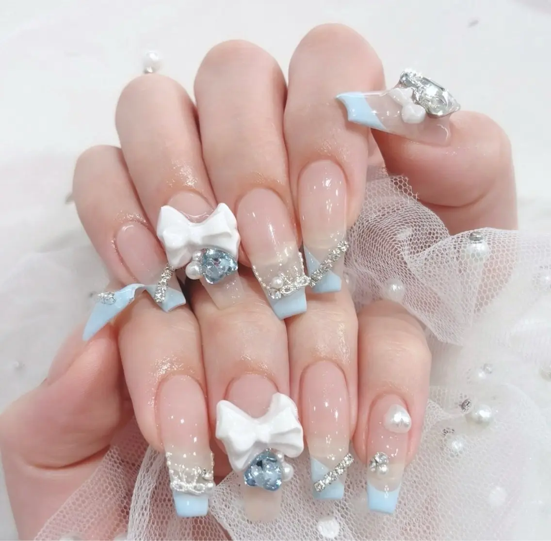 ネイル 成人式 ロングネイル マグネットネイル 大理石ネイル(マーブル) リボン ハンドネイル Amee Nail Salonのネイルデザイン