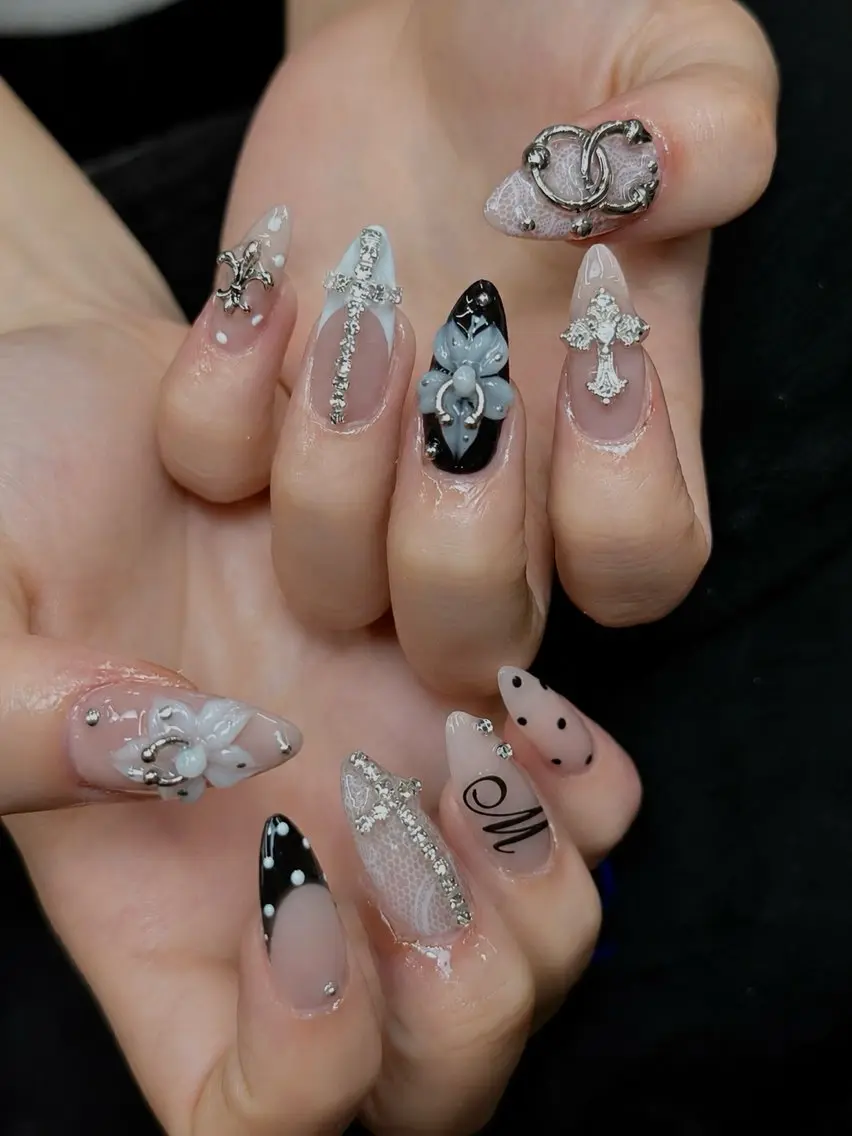 ネイル ジェルネイル キラキラネイル 韓国ネイル ロングネイル リボン Iconic Nailのネイルデザイン