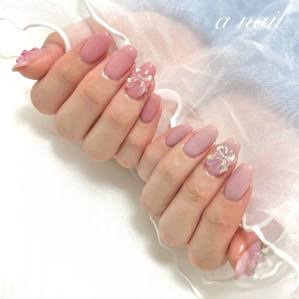 ネイル ワンカラーネイル リボン 春ネイル Salon_ a.nailのネイルデザイン