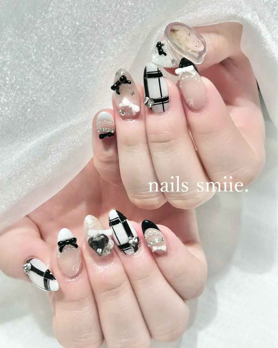 ネイル フレンチネイル リボン nails smiie.のネイルデザイン