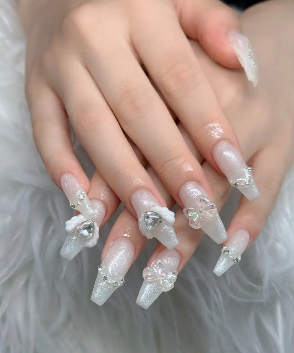 ネイル ロングネイル マグネットネイル リボン 夏ネイル スーパーロングネイル Hani Nail Salonのネイルデザイン