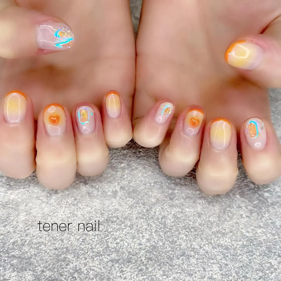 ネイル チークネイル オレンジ テネルネイル tener nailのネイルデザイン