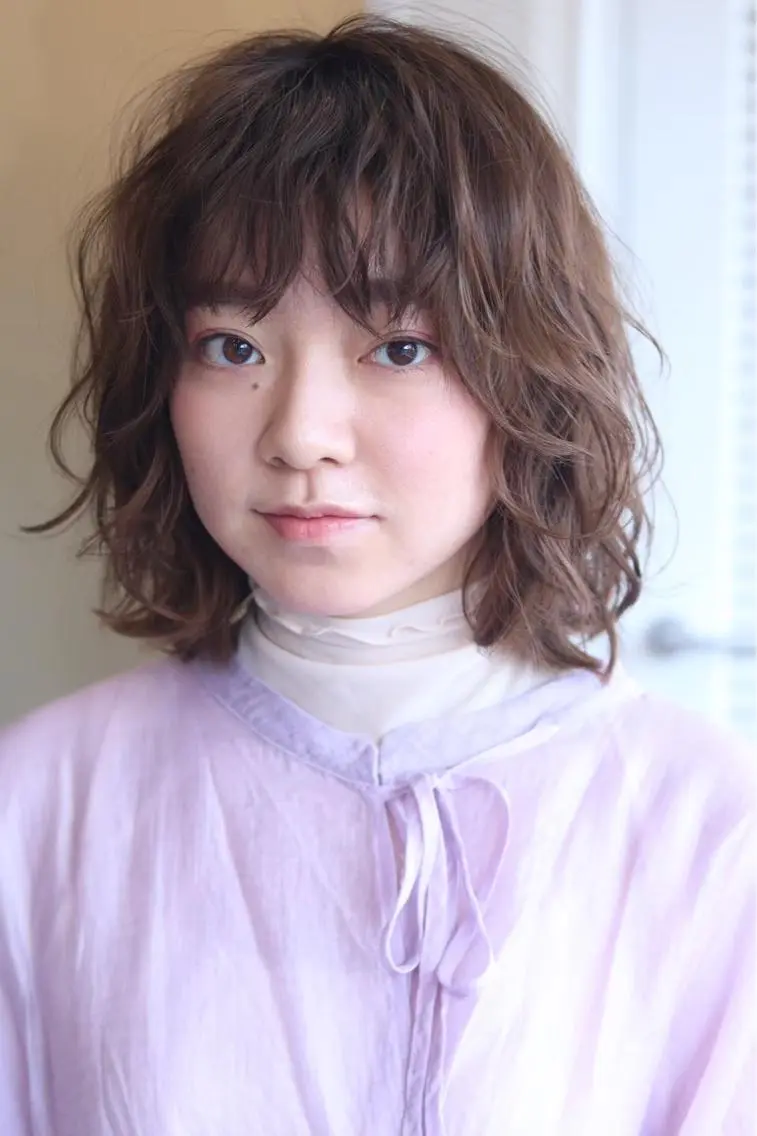 似合わせカット+スタイリングしやすいパーマの写真