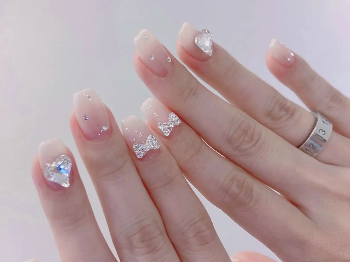 ネイル ガーリー ハート ピンク リボン スクエアネイル ハンドネイル 韓国ネイル/ワンホン ネイル🎀表参道3分のネイルデザイン