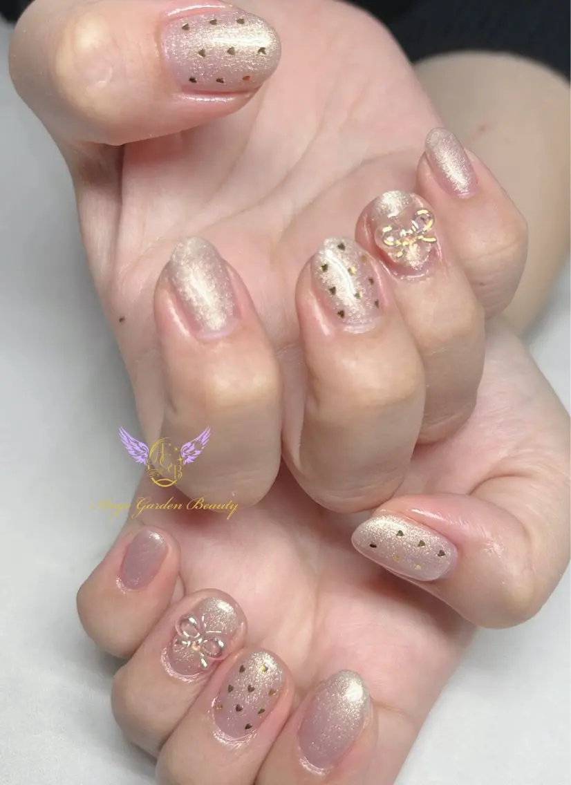 ネイル オーロラネイル クリアネイル ゴールド ハート リボン ハンドネイル AngeGarden Beautymihoのネイルデザイン