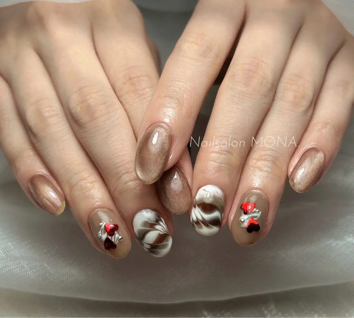 ネイル マグネットネイル 大理石ネイル(マーブル) ピーコックネイル バレンタイン ハンドネイル Nailsalon MONA.のネイルデザイン