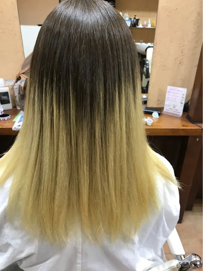 ロング スギモト ヤスゾウのヘアスタイル