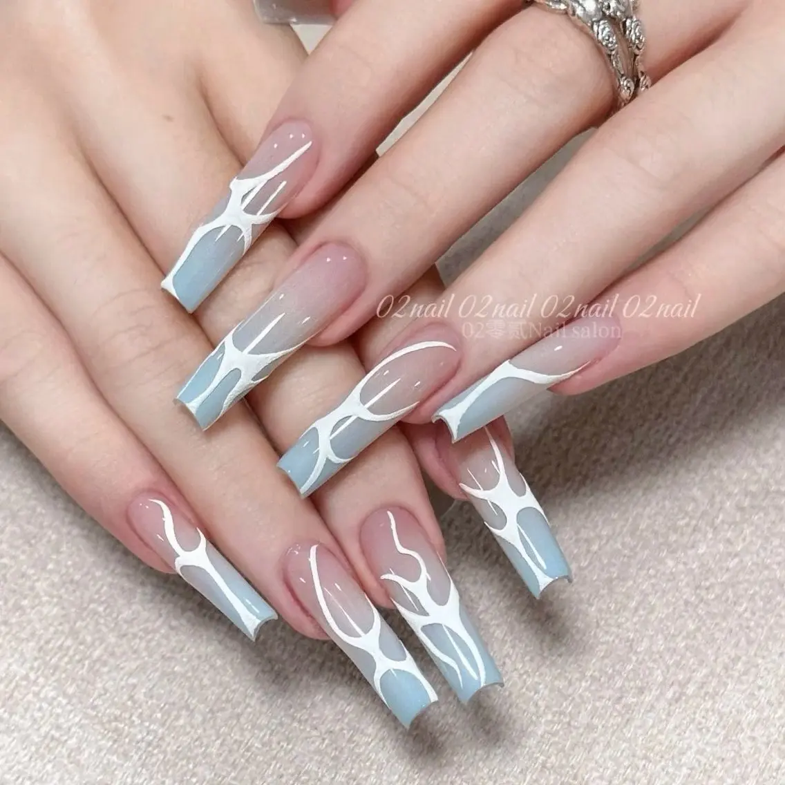 ネイル ブルー ジェルネイル 韓国ネイル ロングネイル スクエアネイル ハンドネイル Blingg NailStudioのネイルデザイン
