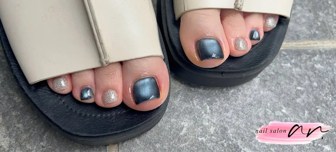 フットネイル🧡親指デザインの写真