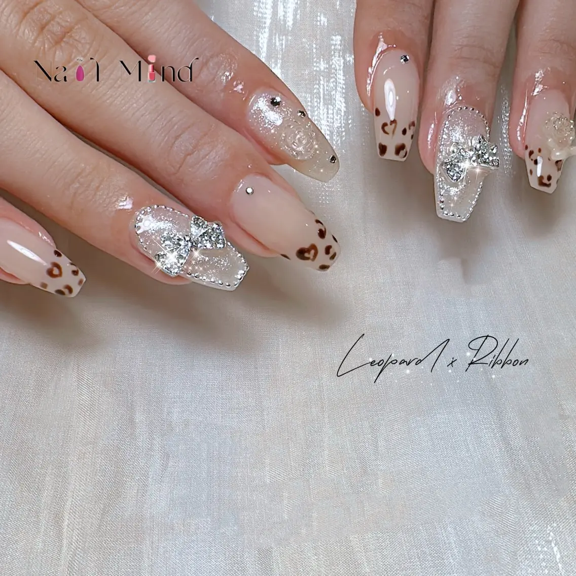 ネイル アニマル柄 ジェルネイル キラキラネイル パラジェル リボン ハンドネイル NailMind Tokyoのネイルデザイン