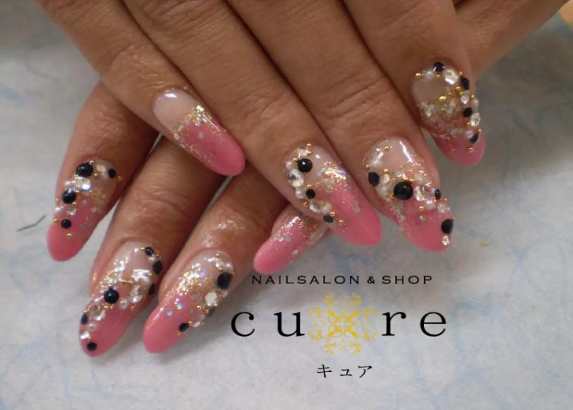 ロング ネイル ピンク ストーンネイル ネイルサロン Cureのネイルデザイン