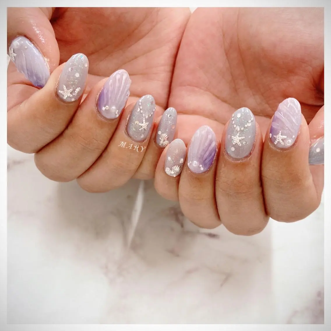 ネイル 水色 ニュアンスネイル パープル 夏ネイル ハンドネイル Mary nail .narumiのネイルデザイン