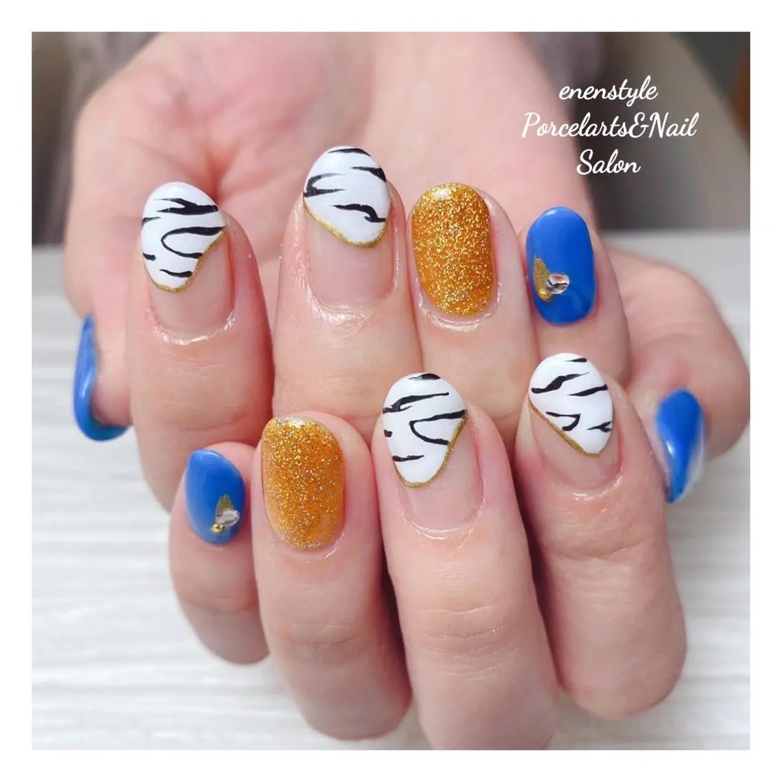 ミディアム ネイル 🐾enen style 🐾のネイルデザイン