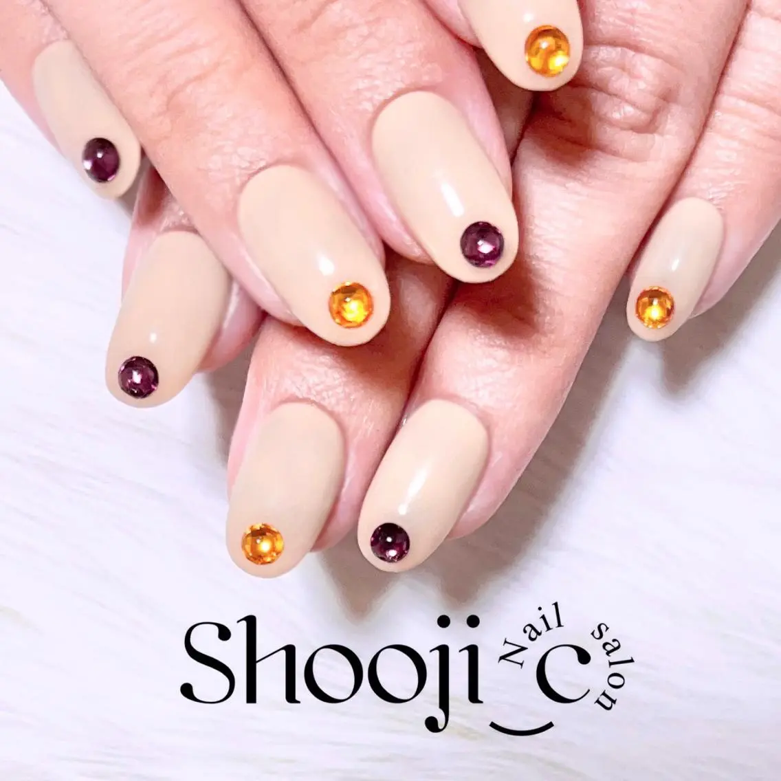 ネイル ハロウィン オレンジ パープル シンプルネイル ストーンネイル Shooji_c Nail salonのネイルデザイン