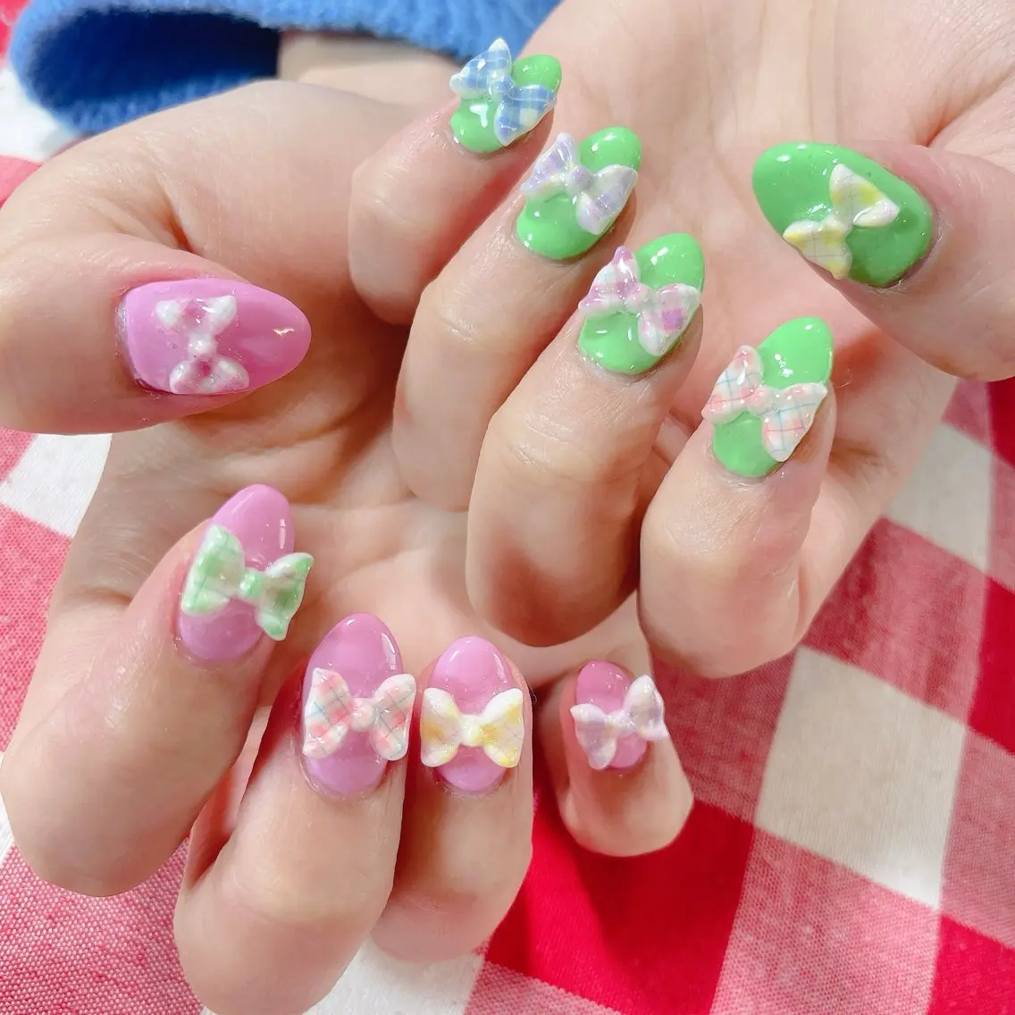 ネイル リボン MignonReve ♡EIMI🌈のネイルデザイン