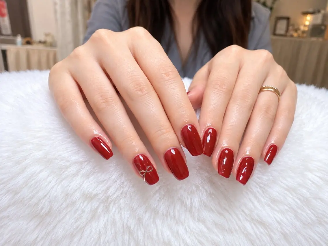 ネイル ジェルネイル 韓国ネイル ワンカラーネイル 赤色 リボン ハンドネイル 高山ルコ(NAIL) 店長のネイルデザイン