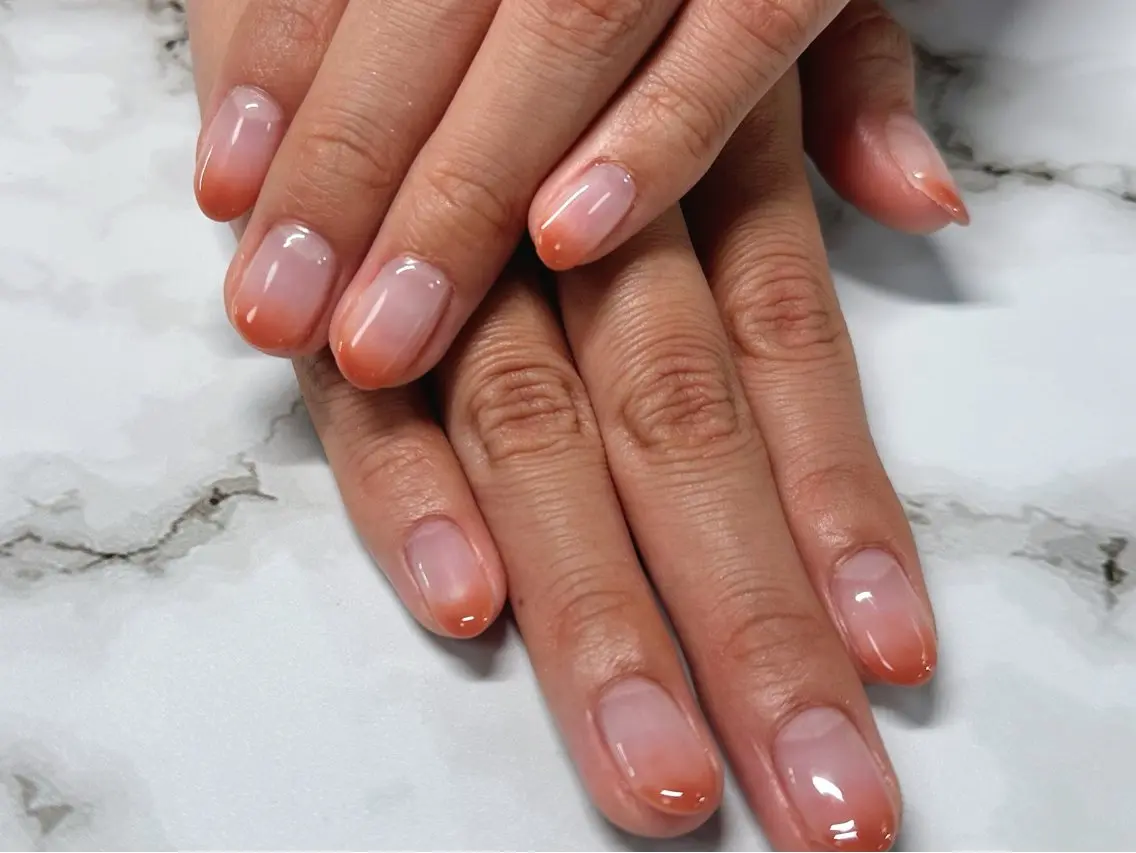 ネイル グラデーション オレンジ KAI NAILS💅🏻✨のネイルデザイン
