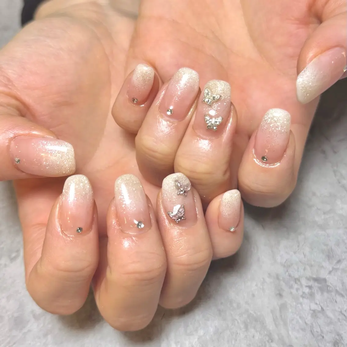 ネイル ガーリー グラデーション ハート キラキラネイル リボン ハンドネイル lillion karenのネイルデザイン