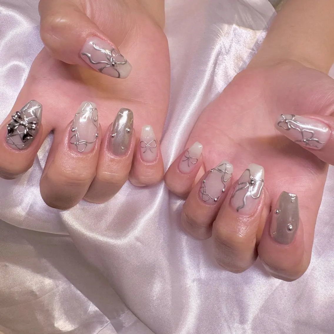 ネイル リボン ハンドネイル nail salon e'mu💐のネイルデザイン