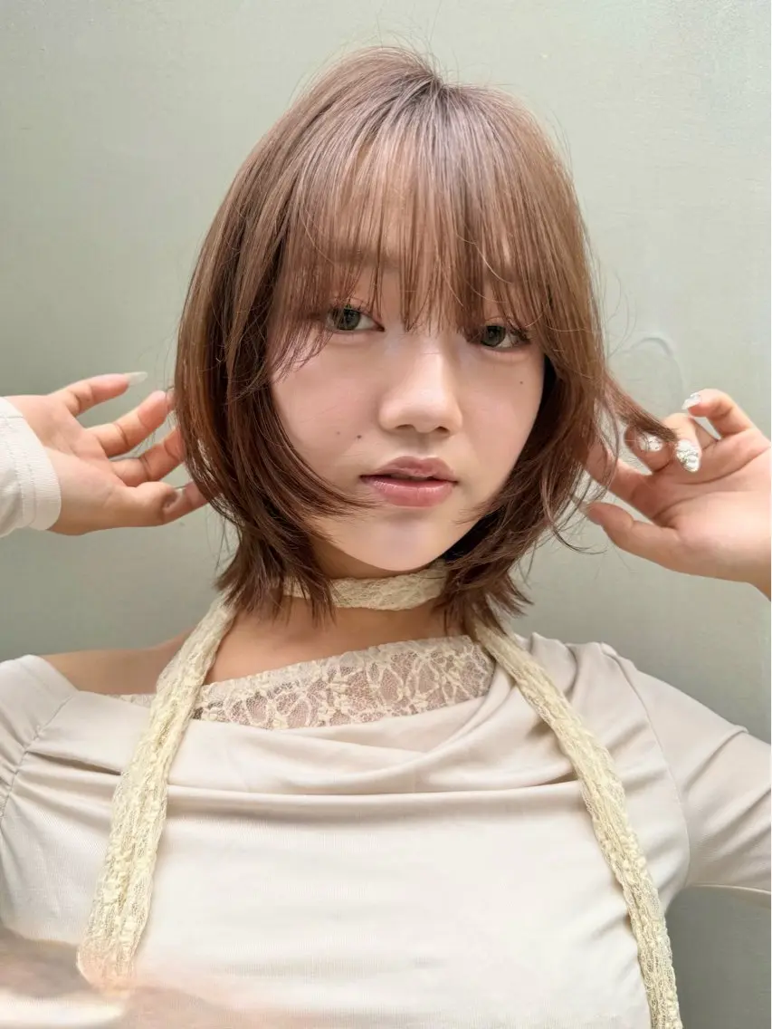ショート 切りっぱなしボブ ボブレイヤー ボブ くびれヘア 顔まわりレイヤー カット ヘアカラー トリートメント SAKURA omotesandoのヘアスタイル
