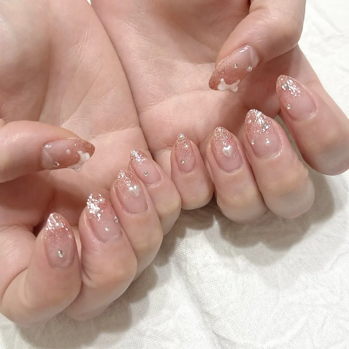 ネイル ハート リボン シルバー ストーンネイル ハンドネイル peaberry nailのネイルデザイン
