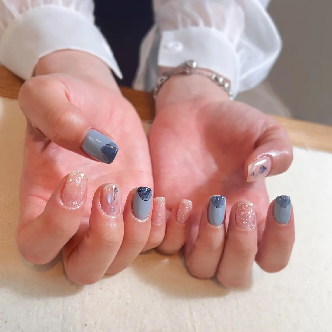 ネイル ブルー クリアネイル ラメ(グリッター) 水色 ニュアンスネイル pointillé .ayaのネイルデザイン