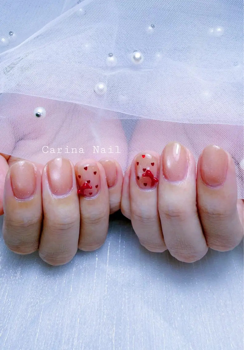 ネイル ガーリー ハート リボン シンプルネイル Carina Nailのネイルデザイン