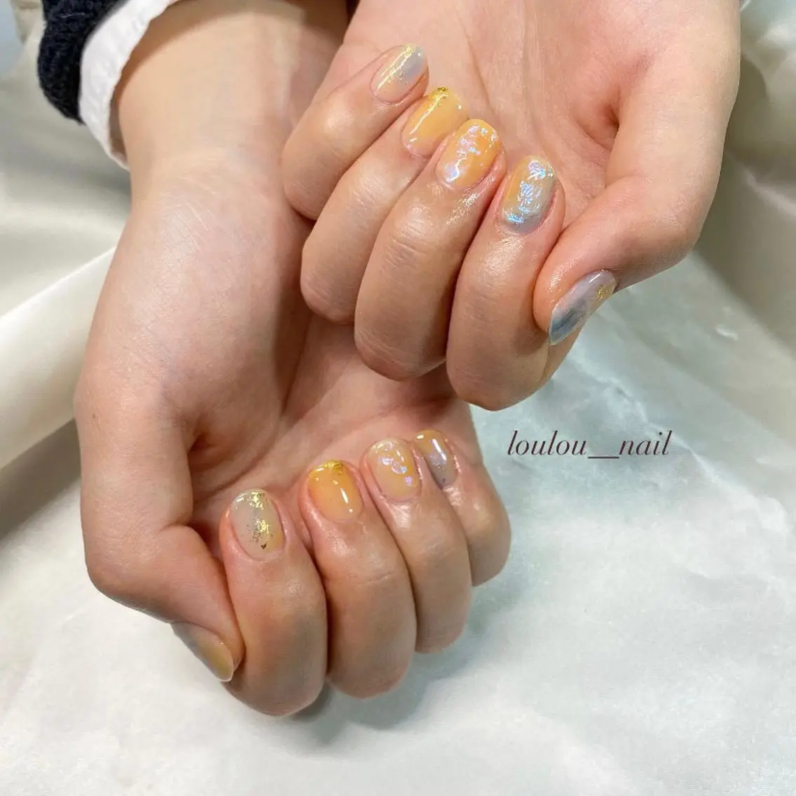 ネイル ブルー ニュアンスネイル オレンジ 葛西 知佳のネイルデザイン