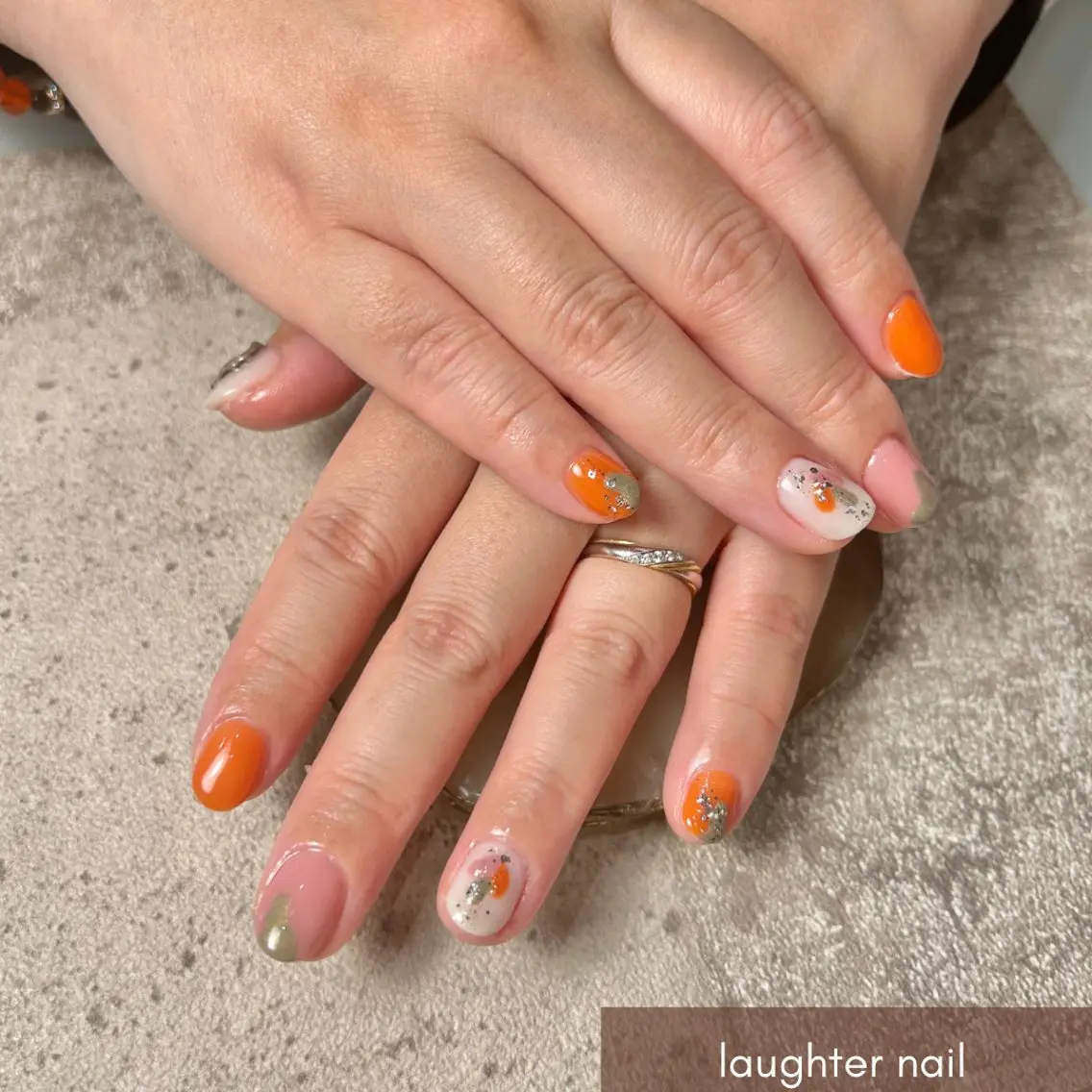 ネイル アートネイル ジェルネイル オレンジ ピンク 冬ネイル ハンドネイル laughter nailのネイルデザイン