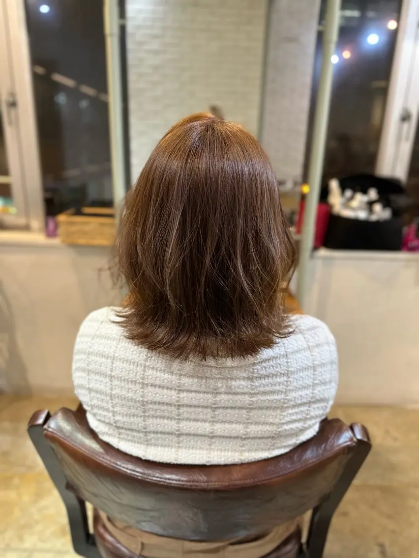 金 春江のヘアスタイル