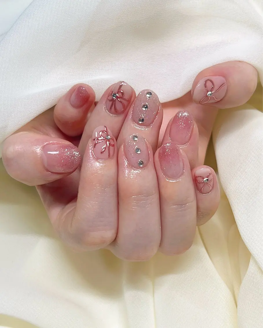 ネイル アートネイル キラキラネイル リボン nail salon MUAのネイルデザイン